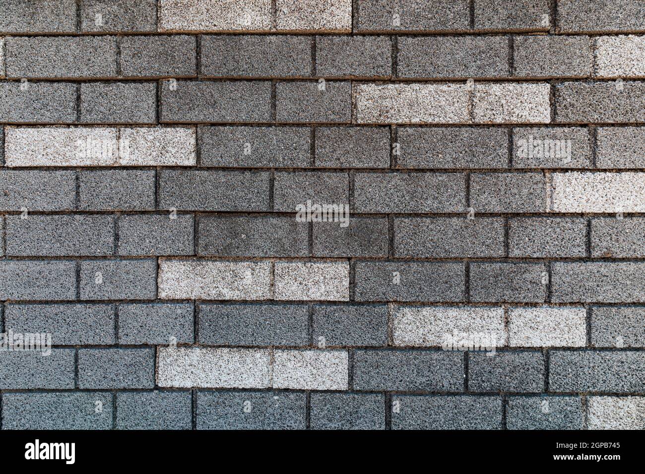 brick wall texture in gray tones with white bricks Stock Photo