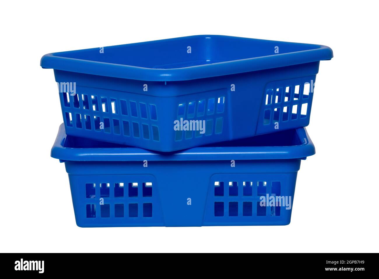 Empty basket isolated. Two empty blue rectangular stacked plastic laundry baskets isolated on a white background. Household equipment. Clipping path. Stock Photo