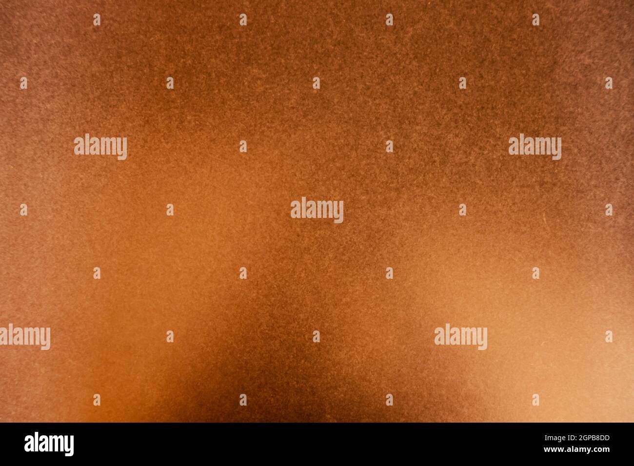 Copper hammered metal plate. Background texture wallpaper Stock Photo