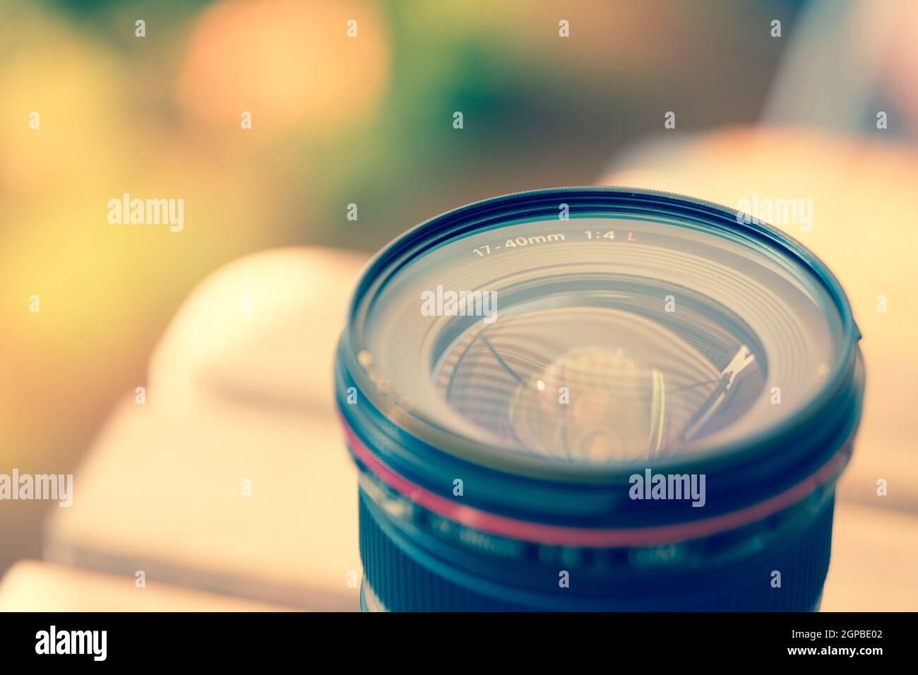 Close up picture of a professional optic photo lens. Smooth blurry