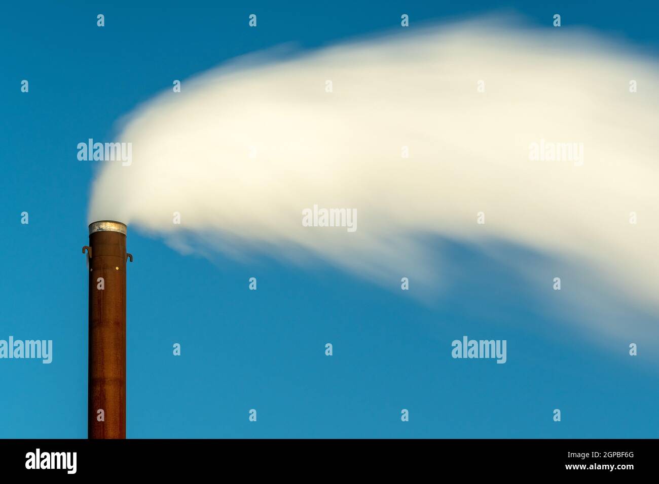 Smoke from chimney of power plant or station. Long exposure image Stock ...