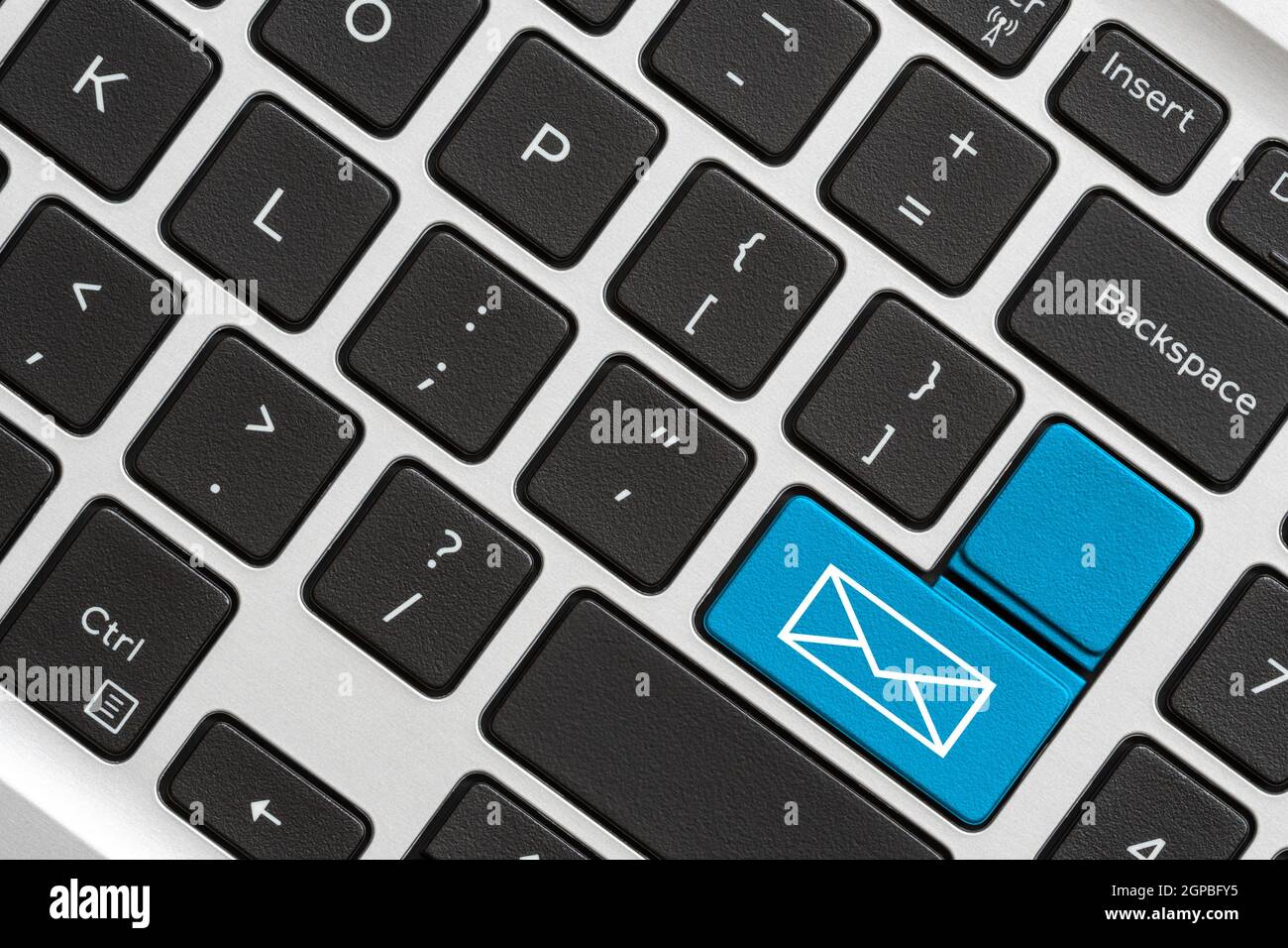 Electronic mail concept. Blue key button with envelope on a computer ...