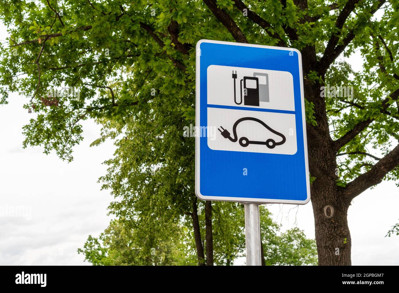 Electric car charging station road sign Stock Photo