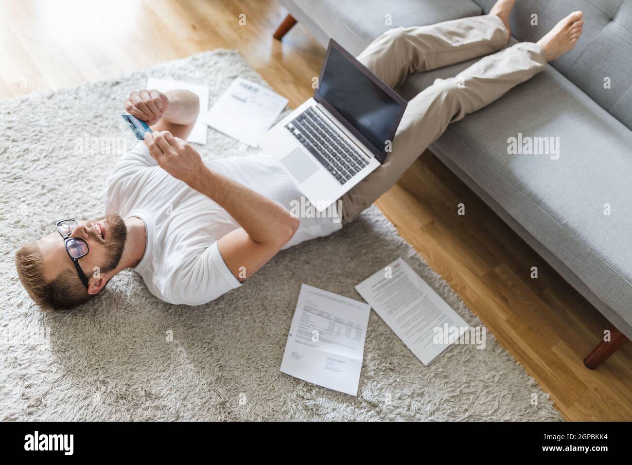 Man working from home during the coronavirus Covid 19 pandemic Stock ...