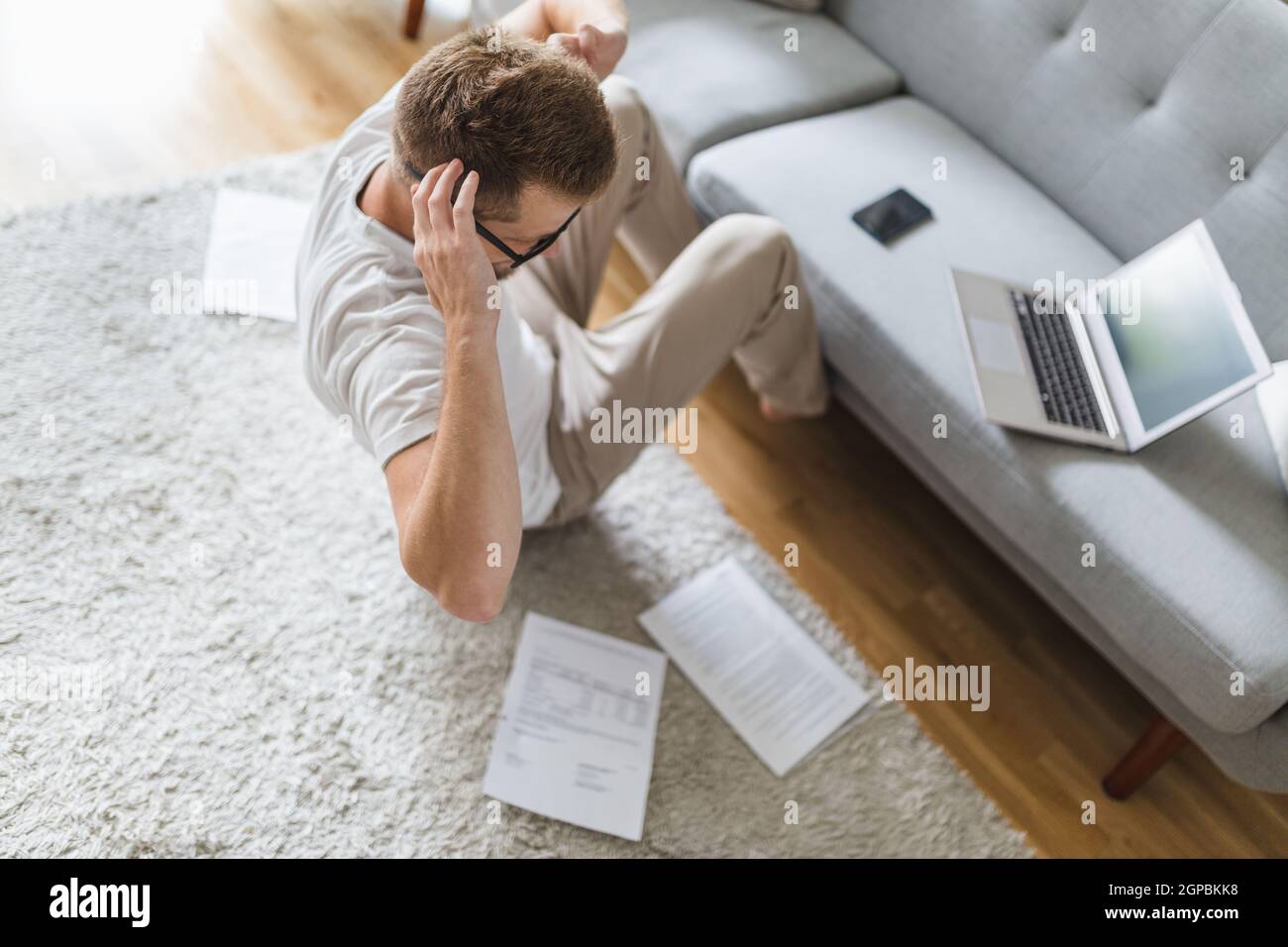 Man working from home during the coronavirus Covid 19 pandemic Stock ...