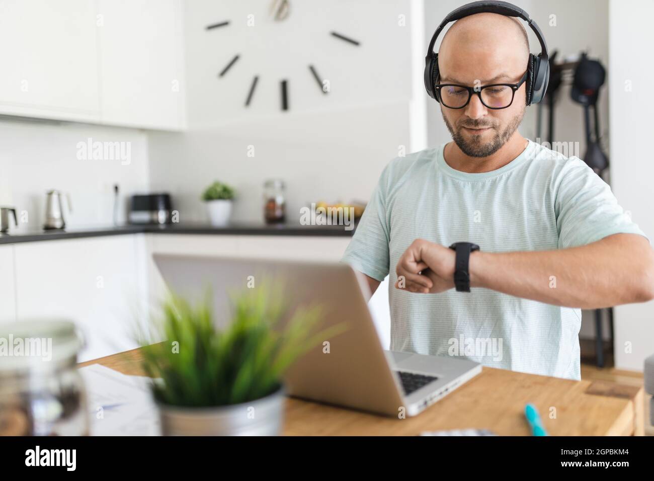 Man working from home during the coronavirus Covid 19 pandemic Stock ...