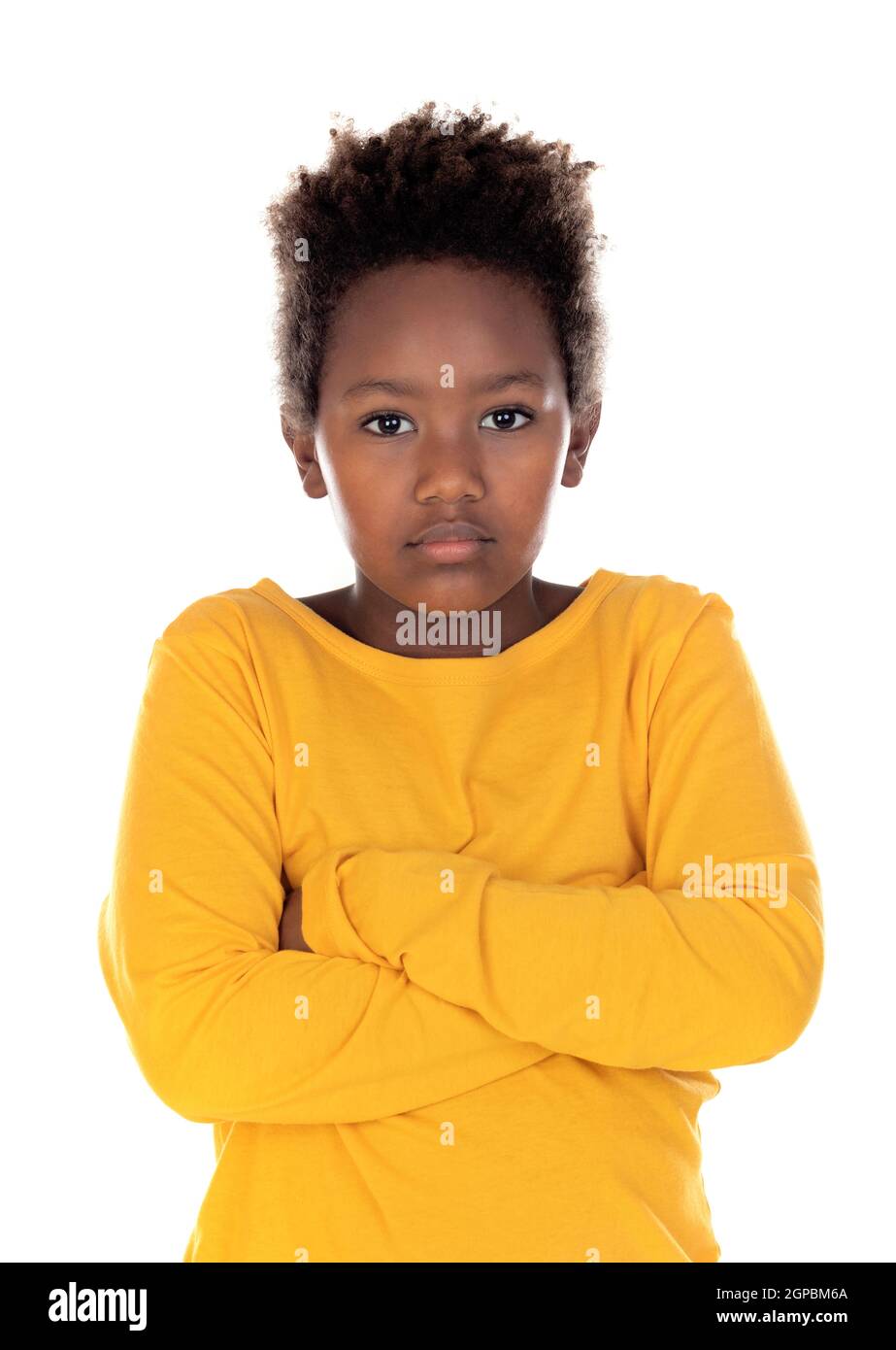 Angry kid with afro hair isolated on a white background Stock Photo