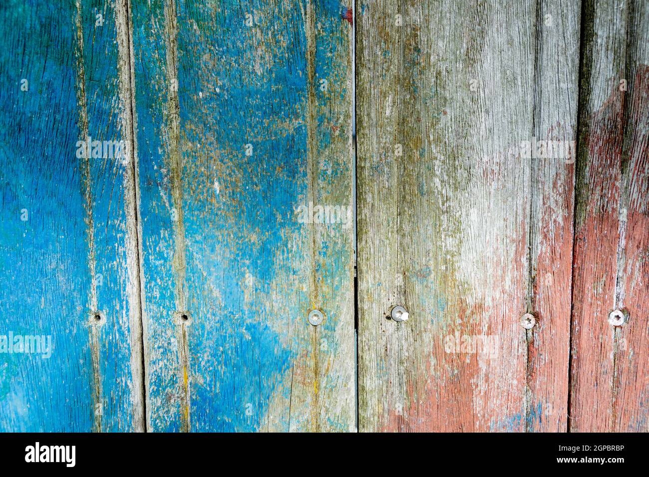 Wooden surface covered with splattered paint. Authentic texture Stock Photo