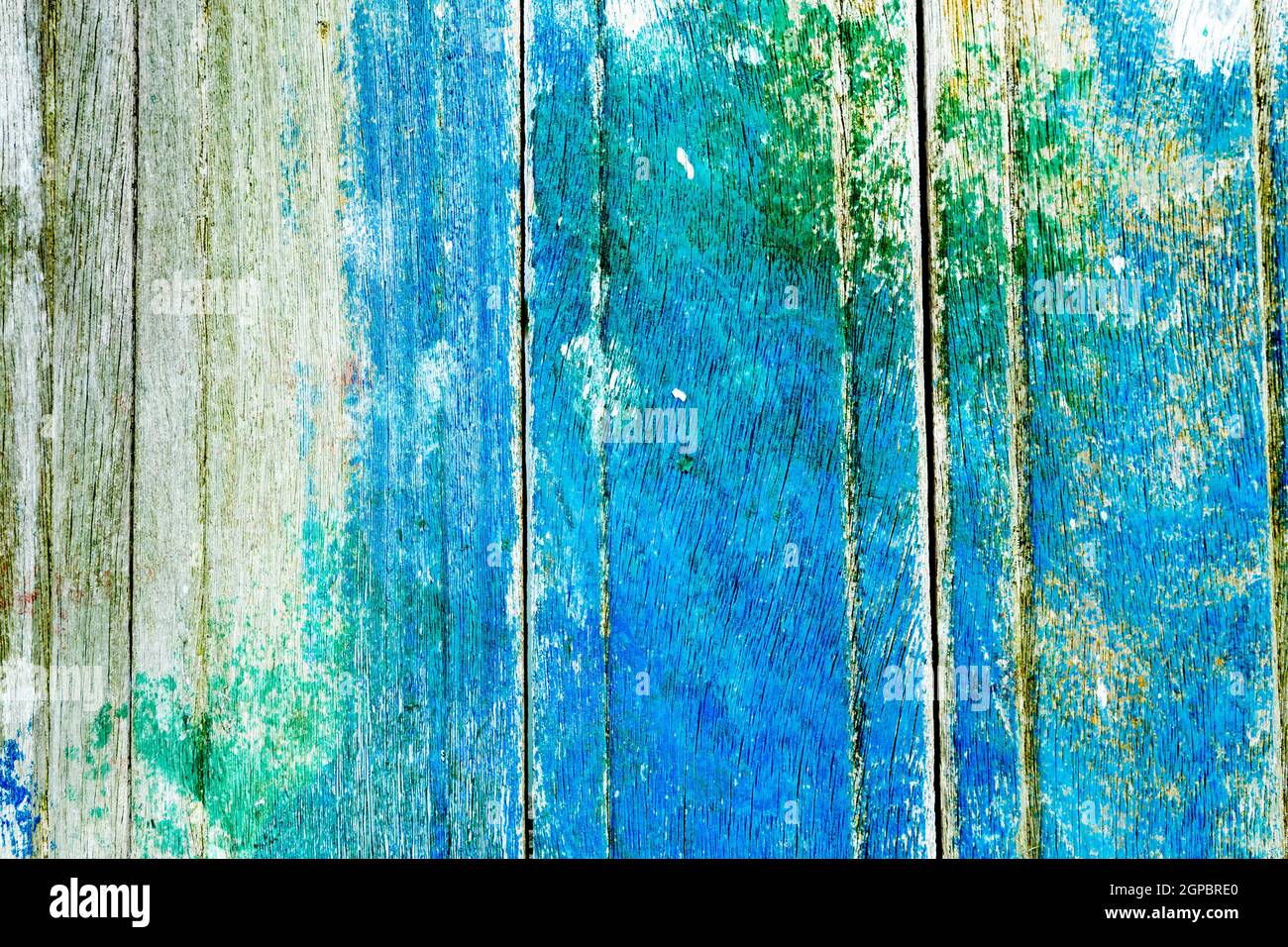 Wooden surface covered with splattered paint. Authentic texture Stock Photo