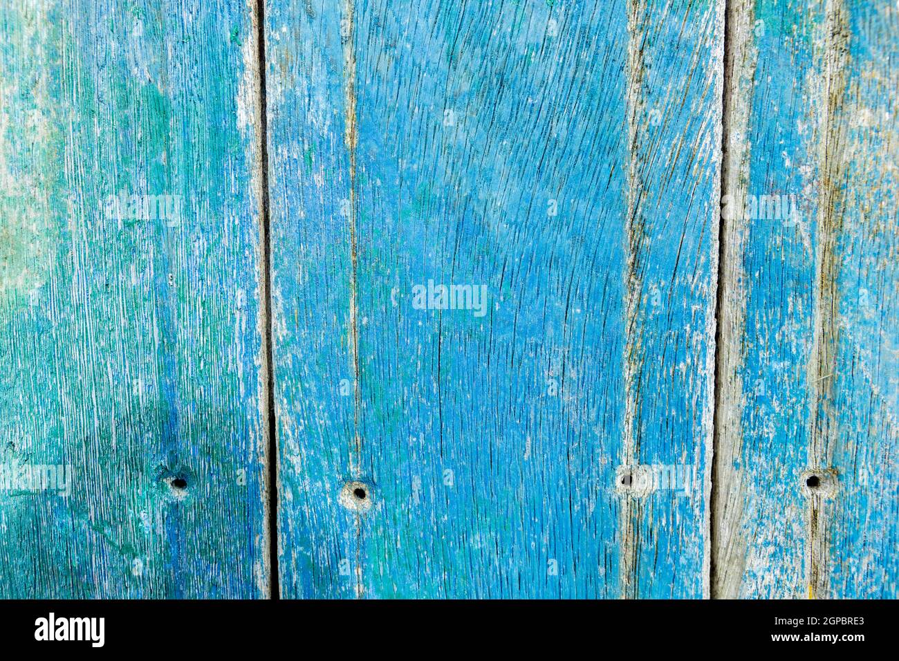 Wooden surface covered with splattered paint. Authentic texture Stock Photo