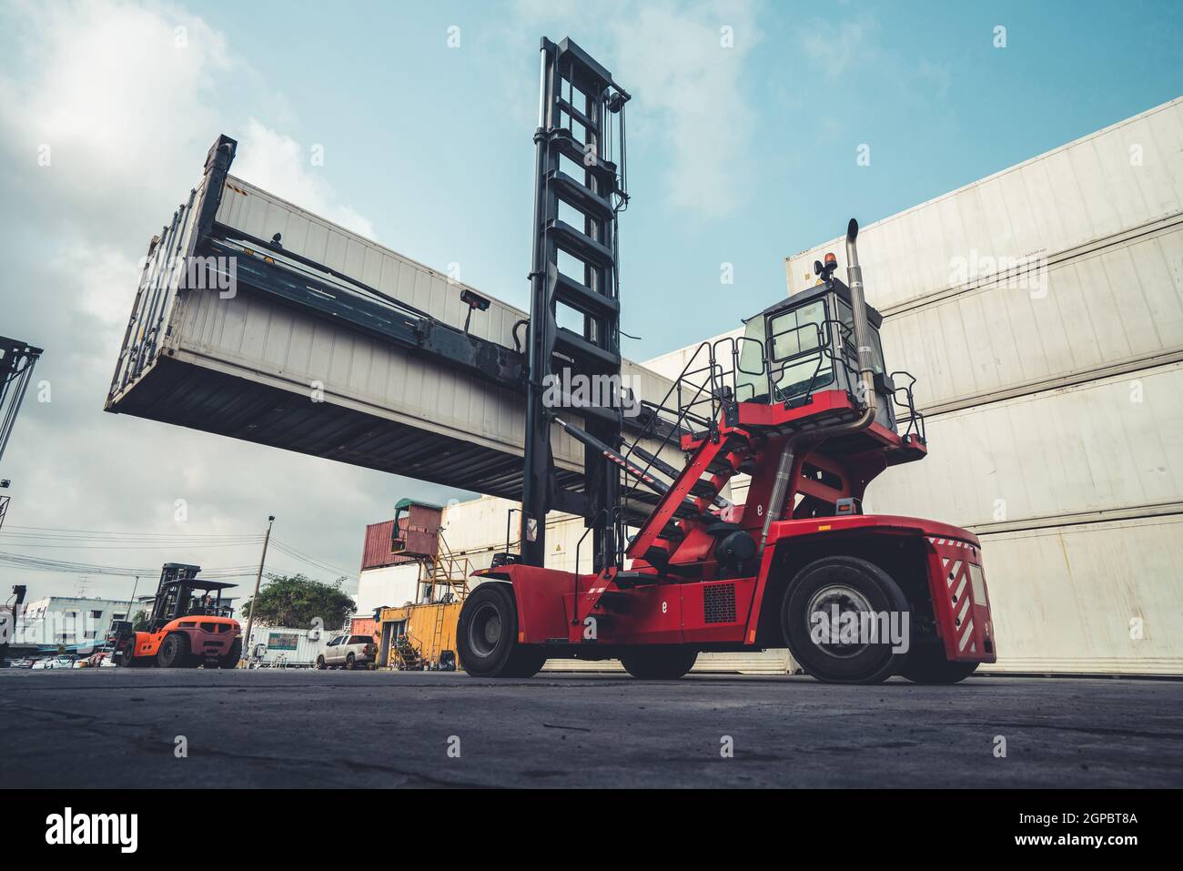 Cargo container for overseas shipping in shipyard with heavy machine
