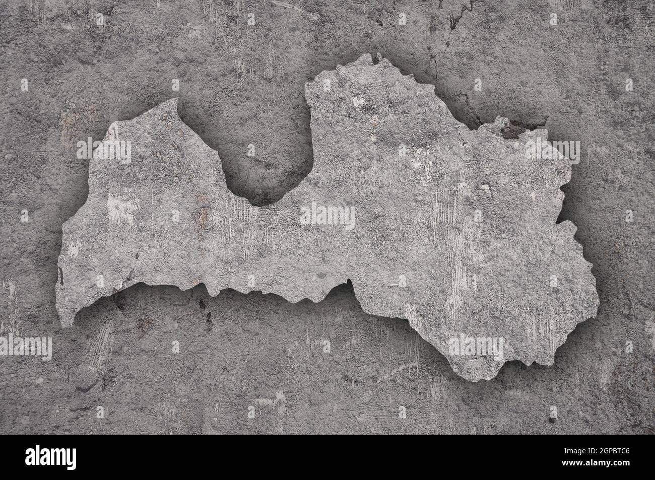 Map of Latvia on weathered concrete Stock Photo - Alamy