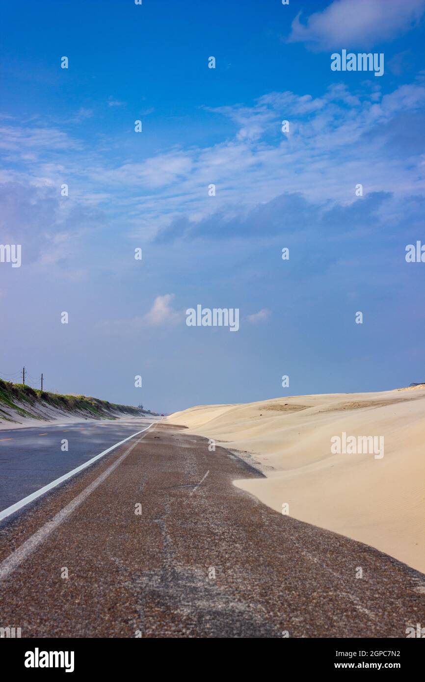 Shifting sand dunes line Ocean Boulevard north of South Padre Island, TX. Stock Photo