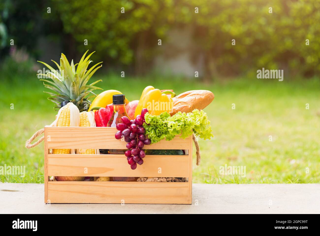Full fresh vegetables and fruits in crate wood box, harvest organic ...