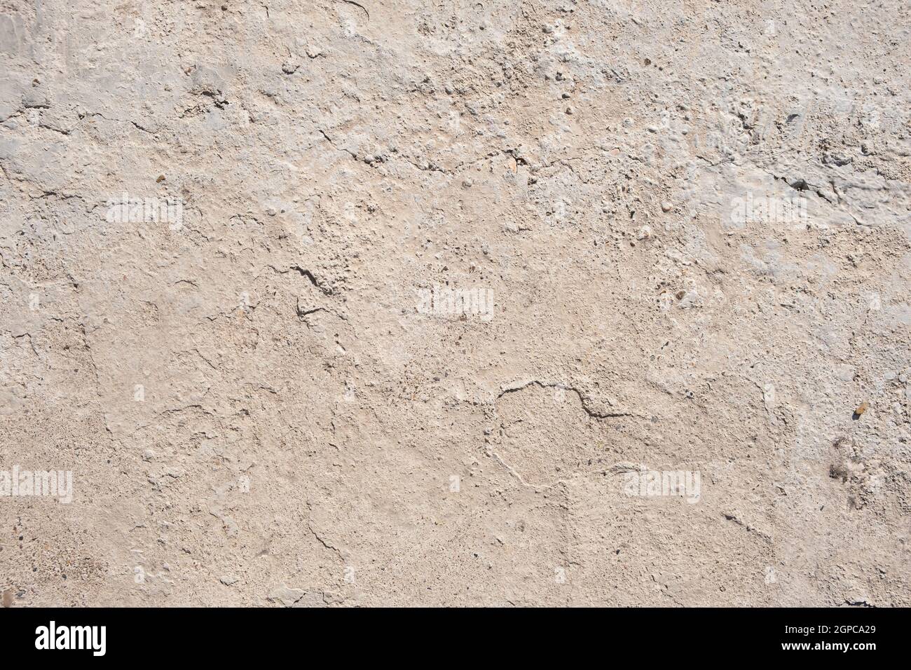 Concrete gray background, top view. flawed cement screed. Stock Photo