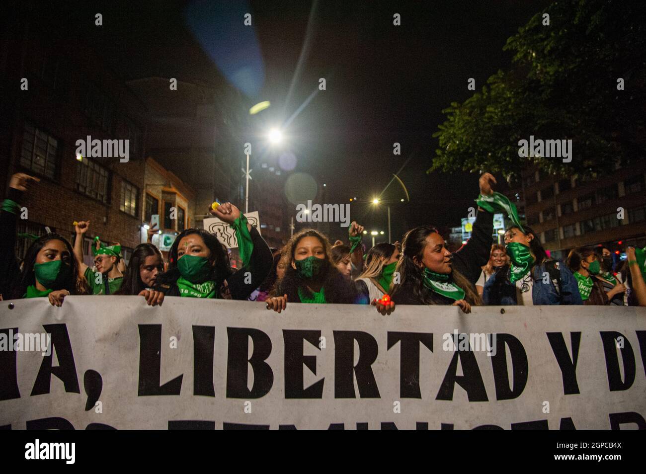 Bogota, Colombia. 28th Sep, 2021. Demonstrators hold a sign with the word 'Libery' during a demonstration demanding the decriminalization of abortion during the Global Day of Action for Legal and Safe Abortion in Latin America and the Caribbean in Bogota on September 28, 2021. Credit: Long Visual Press/Alamy Live News Stock Photo