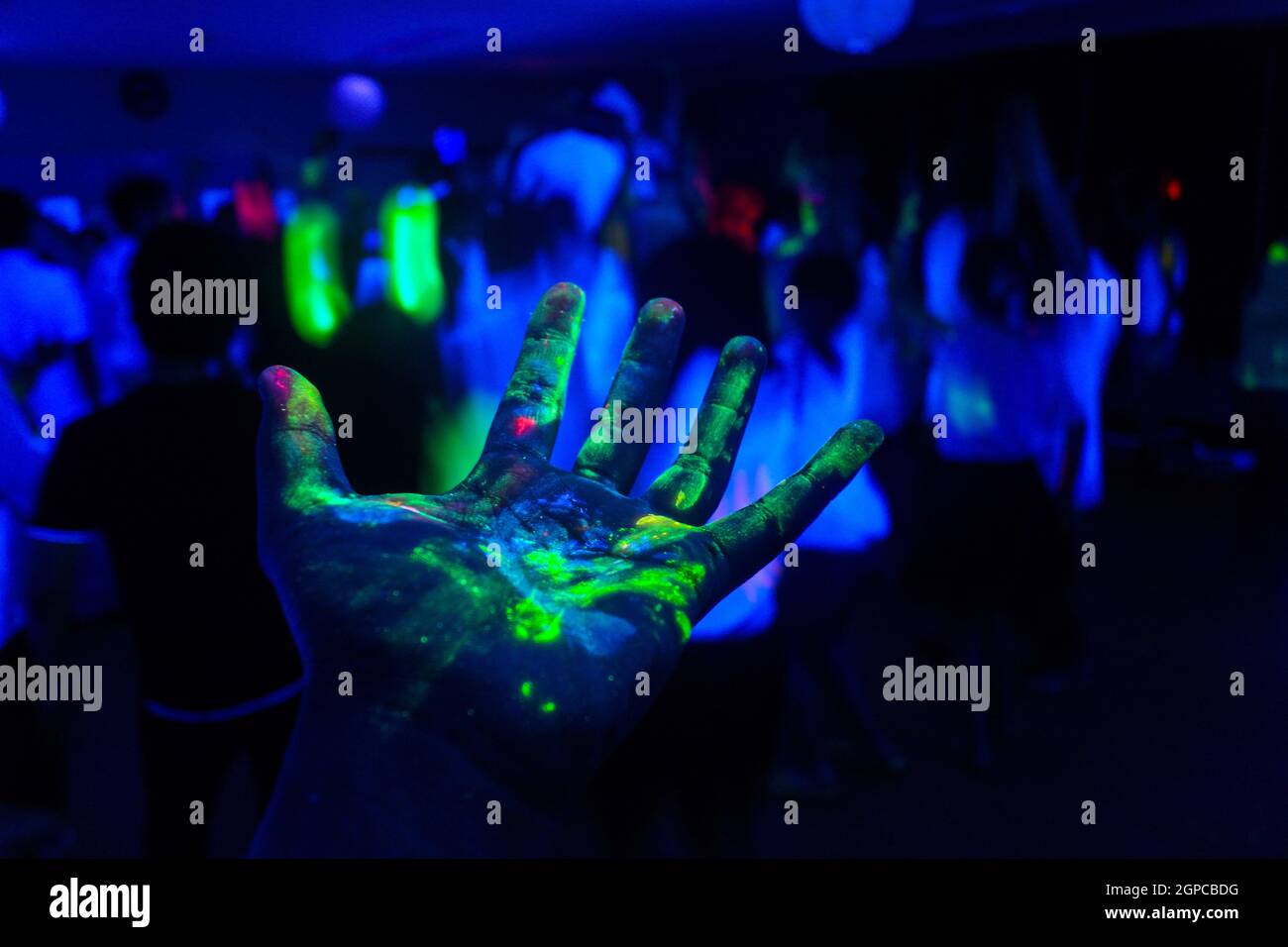 Hand with a fluorescent paint. Shooting Location Tokyo metropolitan