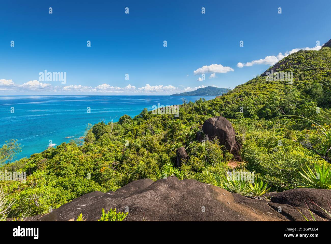 View from Anse Major Nature Trail over the northwest coastline of Mahe island, Seychelles. Stock Photo