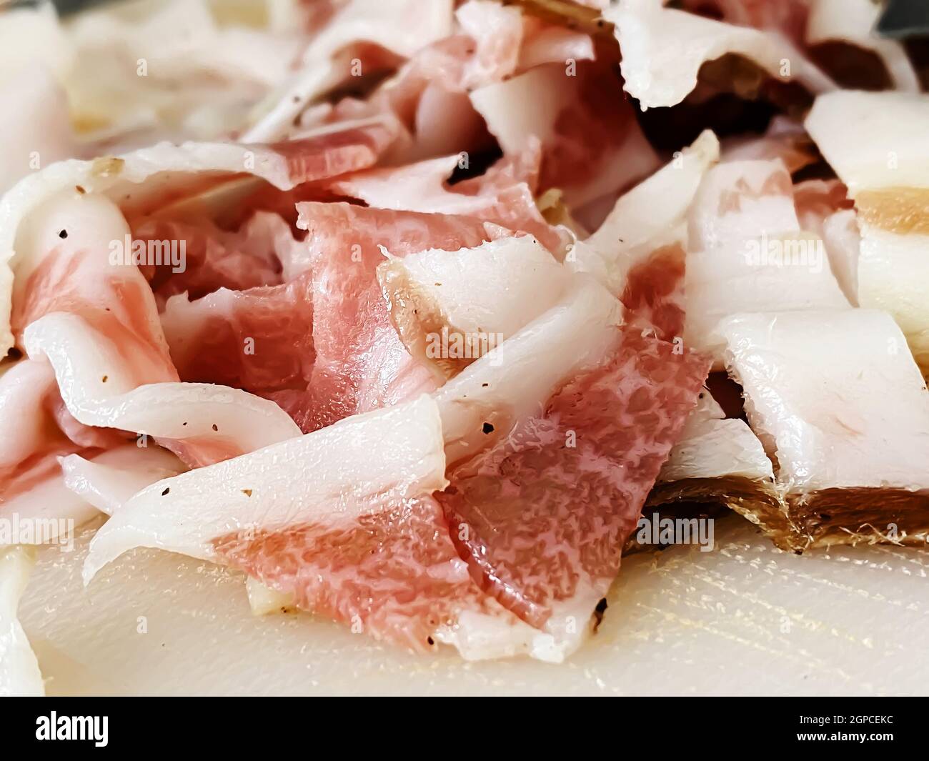 Guanciale cut into small pieces to season the carbonara pasta. Typical