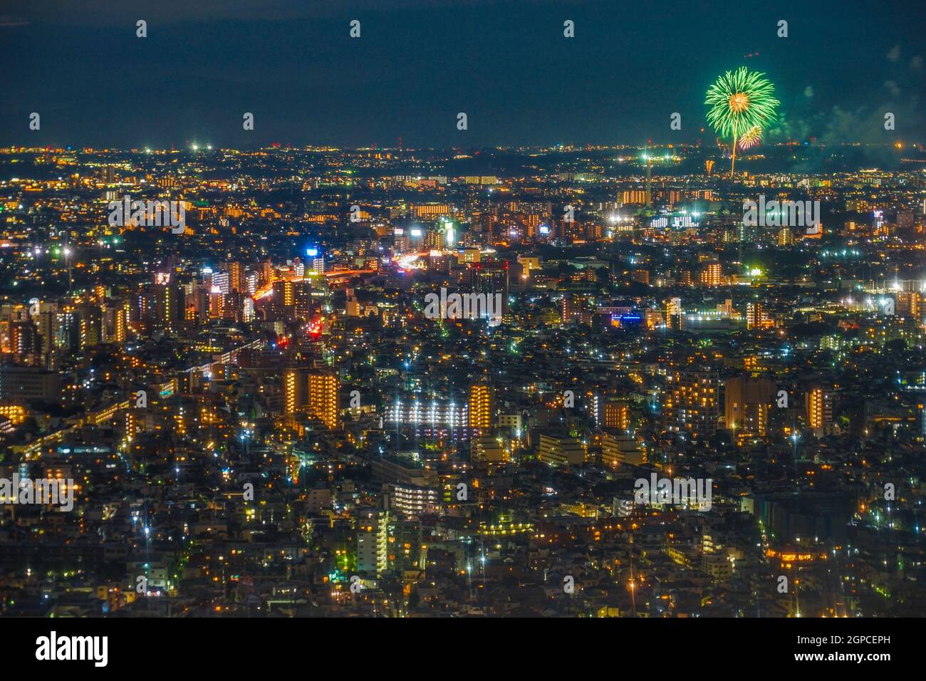 Chofu fireworks visible from the Tokyo Metropolitan Government Building observatory. Shooting Location: Tokyo metropolitan area Stock Photo