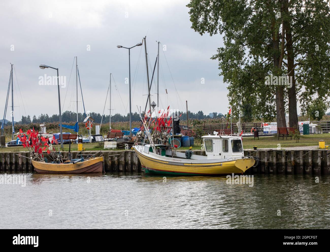 Katy Rybackie, Poland - Sept 4, 2020:  Fishing boats in port on the Vistula Lagoon in Katy Rybackie village located on the Vistula Spit between lagoon Stock Photo