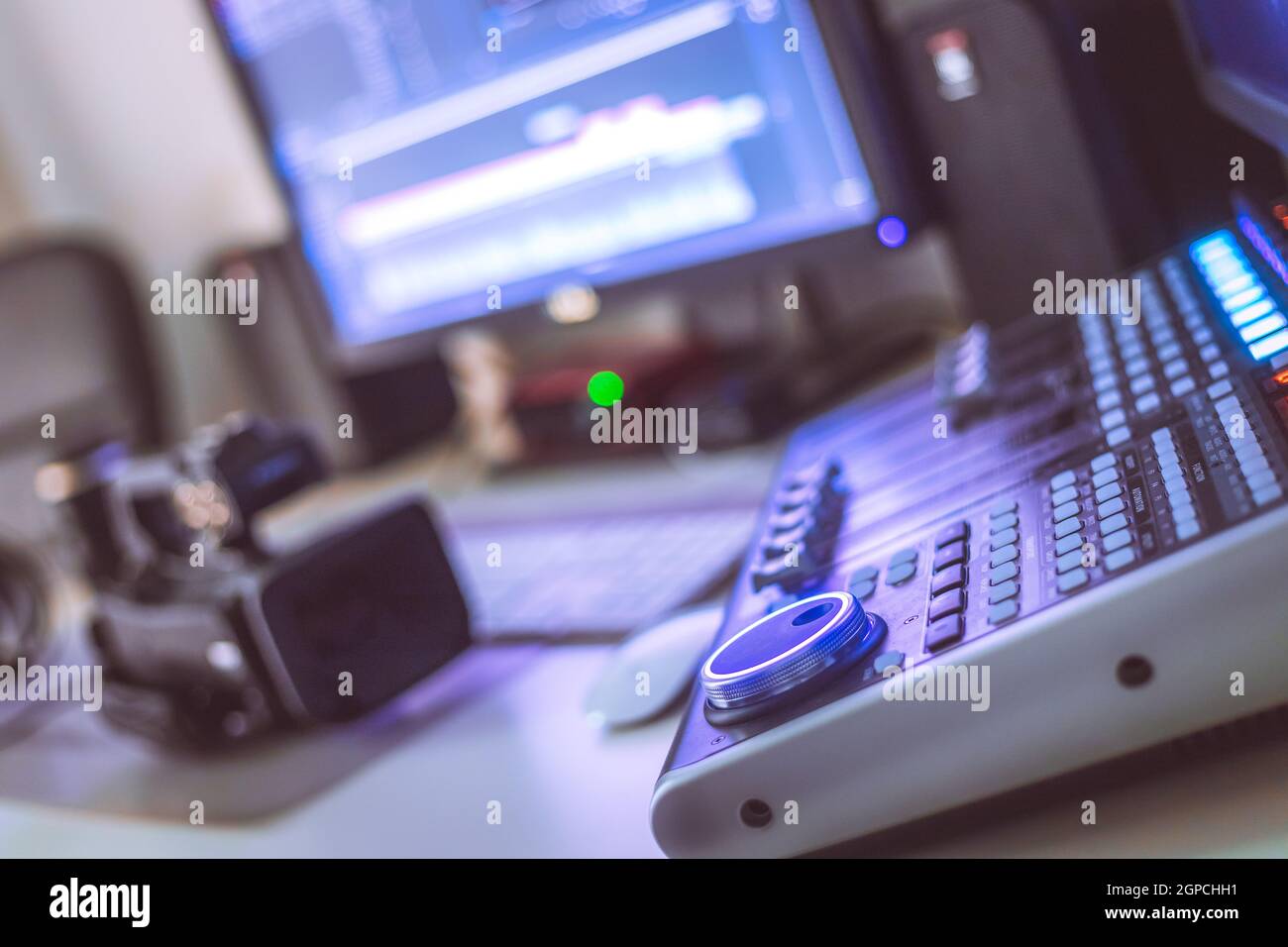 Video editing, recording and cutting room with monitors, camera and