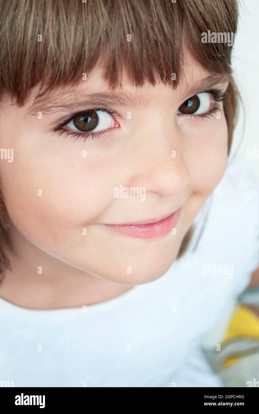 Closeup portrait of beautiful young girl in white Stock Photo - Alamy
