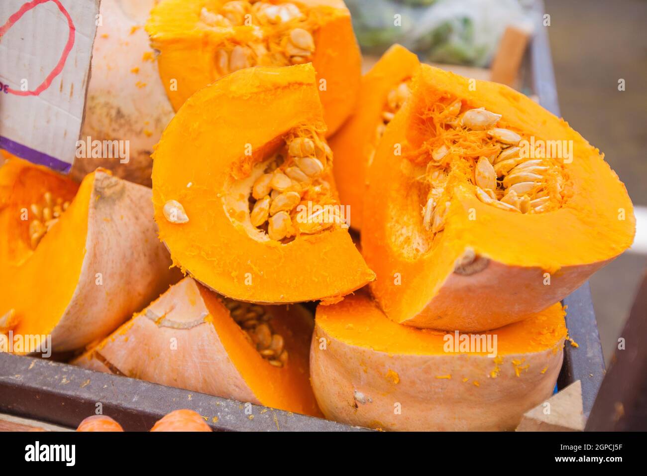 Pumpkin for sale on stall at local food farmers market Stock Photo - Alamy