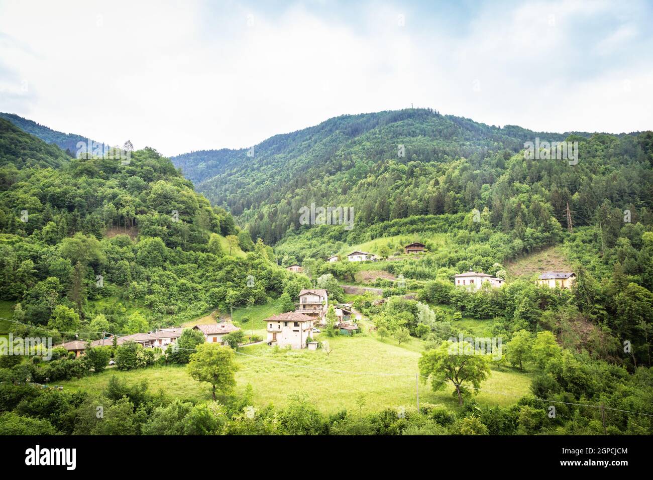 Panoramic natural landscapes with house. Wide-open spaces. Collio, province of Brescia, Val Trompia, Lombardy, Italy. Stock Photo