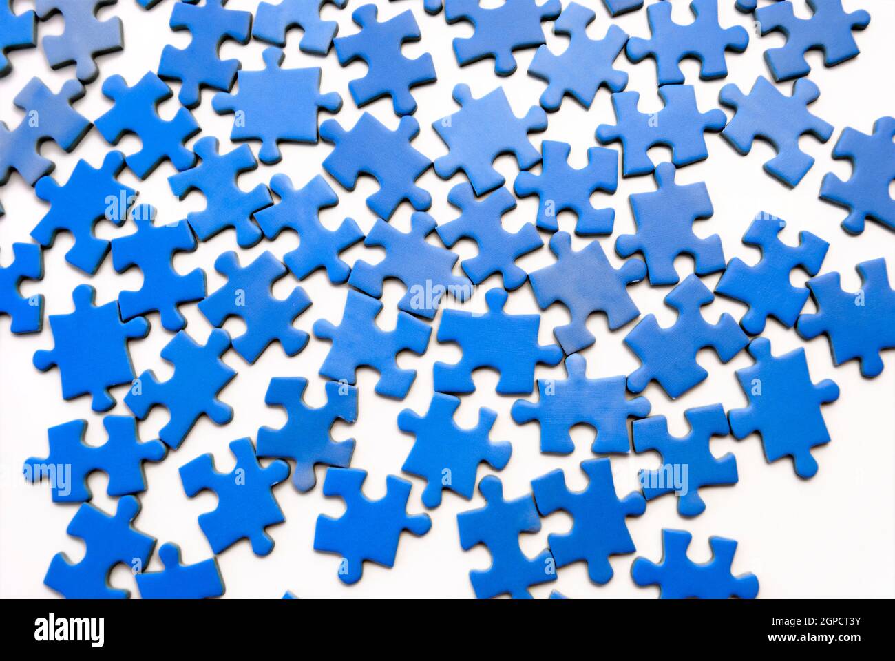 Blue puzzle over white background Stock Photo