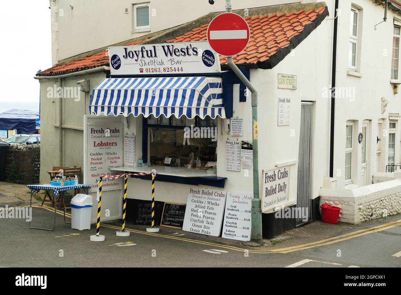 Seafood shop signs, in Sheringham on the North Norfolk coast. Stock Photo