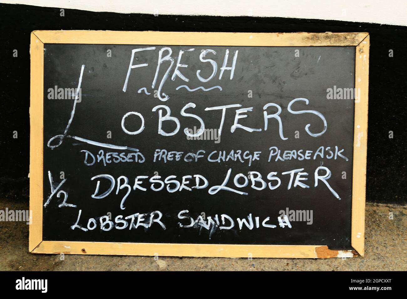 Seafood shop signs, in Sheringham on the North Norfolk coast. Stock Photo