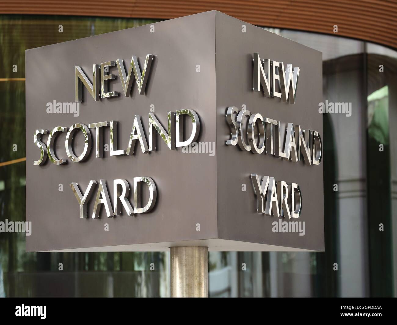 Rotating New Scotland Yard sign in Westminster, London, UK Stock Photo