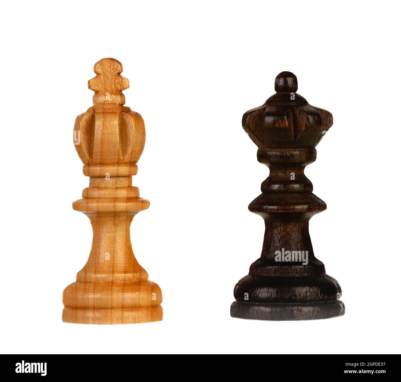 Wooden brown chess pieces on a white background Stock Photo