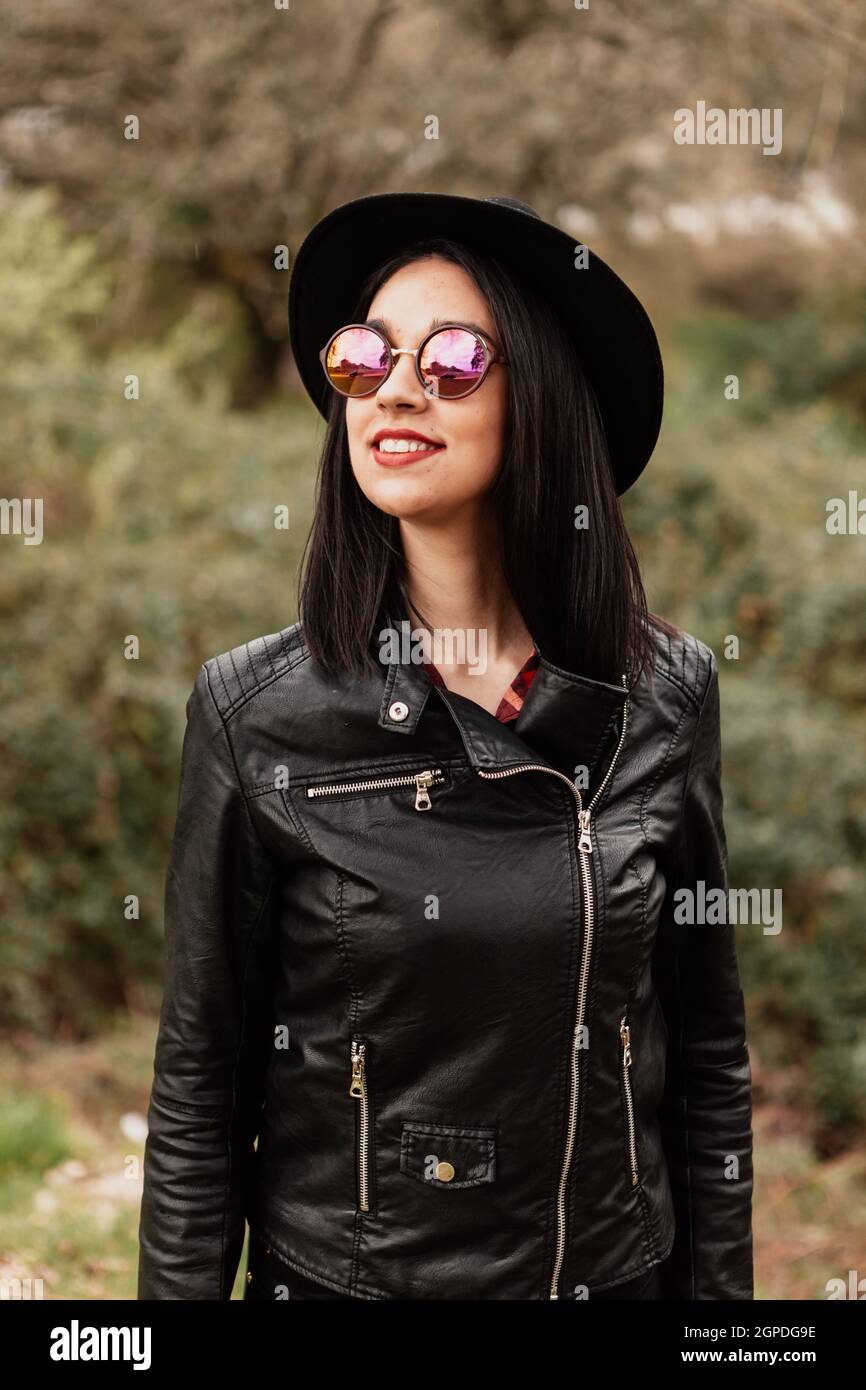 Pretty girl with leather jacket and red lips Stock Photo Alamy