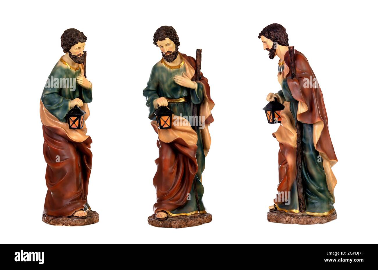 Three figures of Saint Joseph of the Nativity scene isoalted on a white background Stock Photo