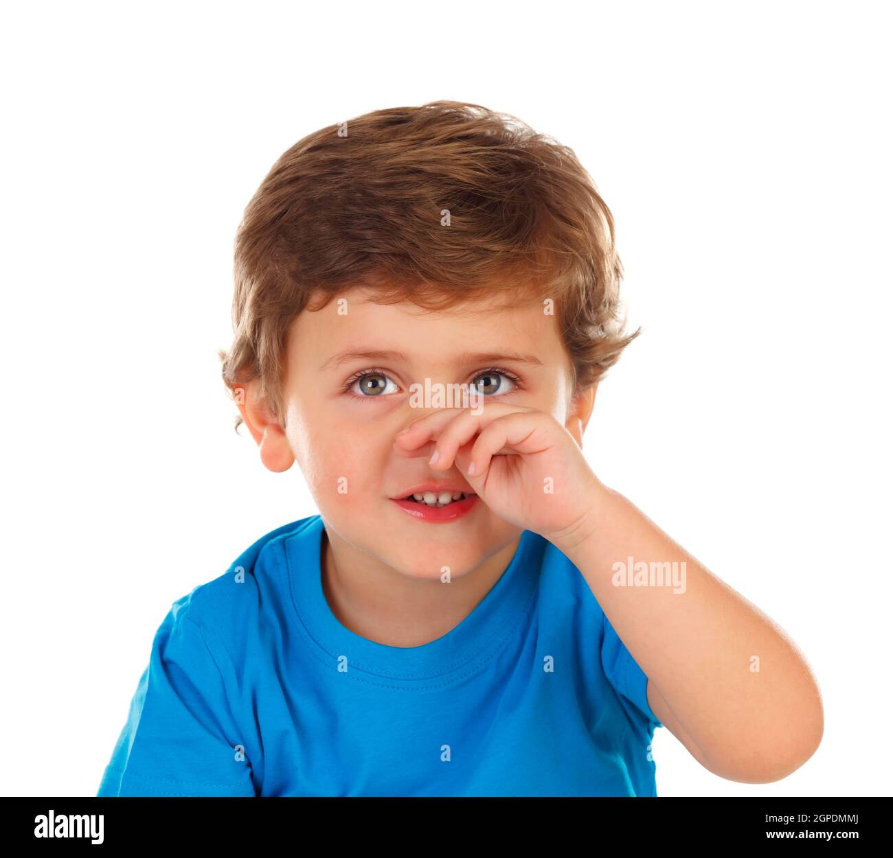 Funny child scratching his nose isolated on a white background Stock