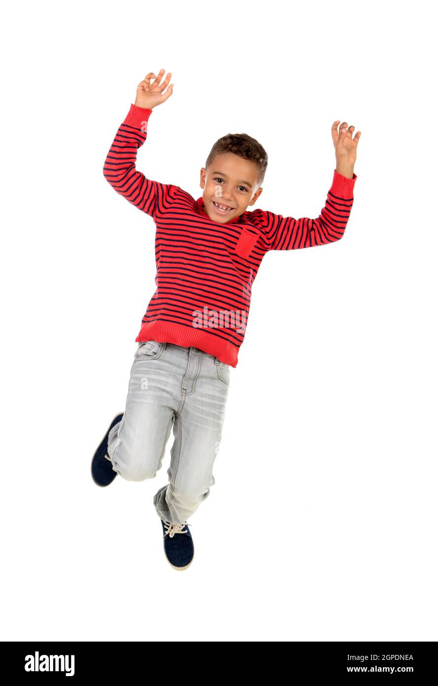Happy latin child jumping isolated on a white background Stock Photo