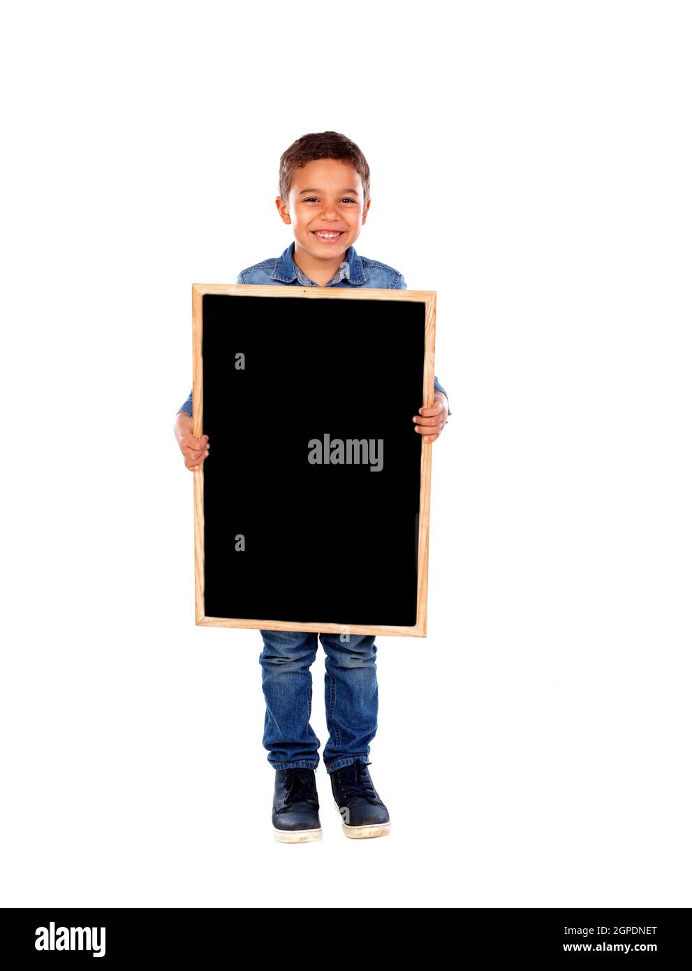 Happy child holding a blank slate isolated on a white background Stock Photo
