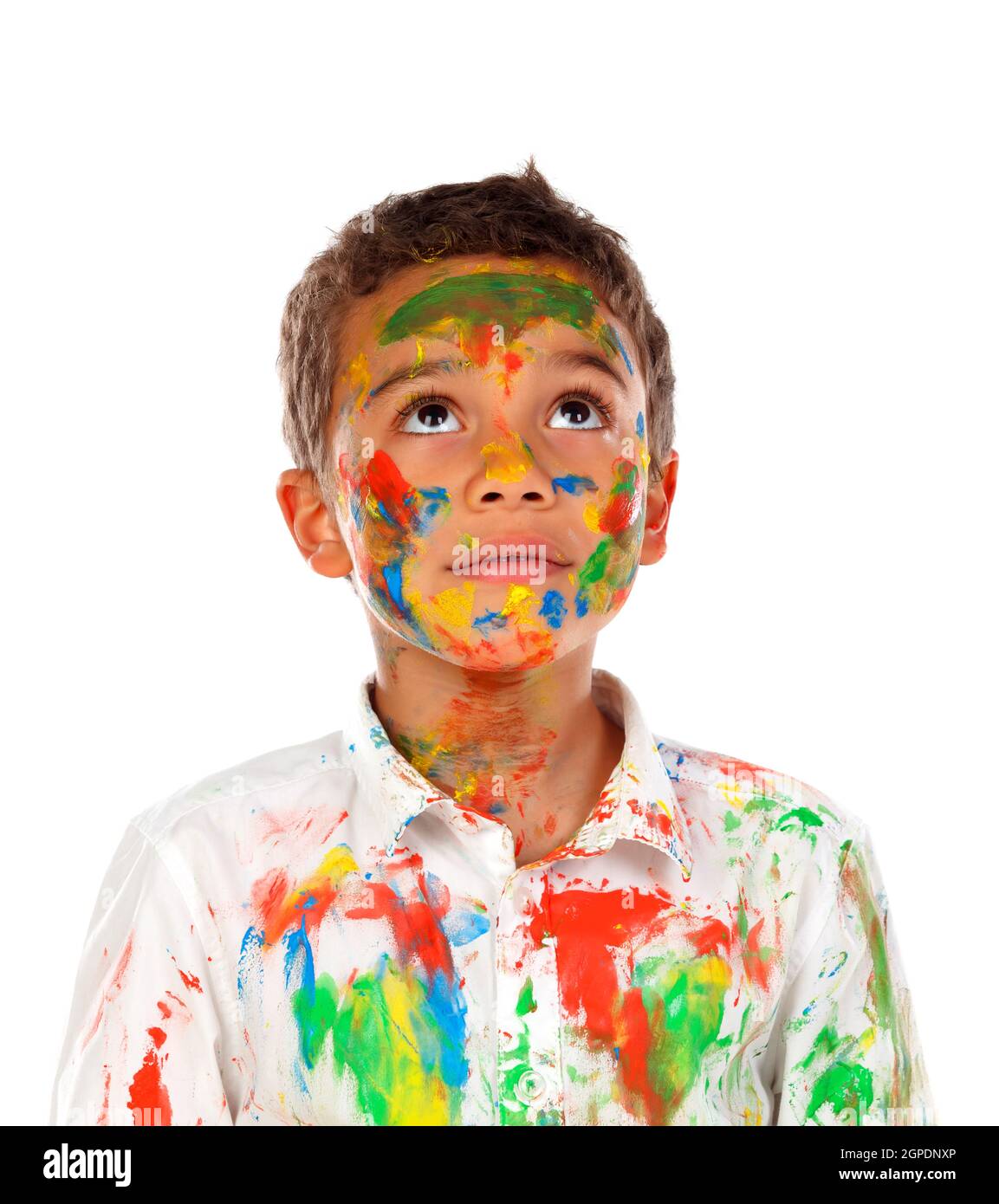 Funny boy with hands and face full of paint isolated on a white background Stock Photo