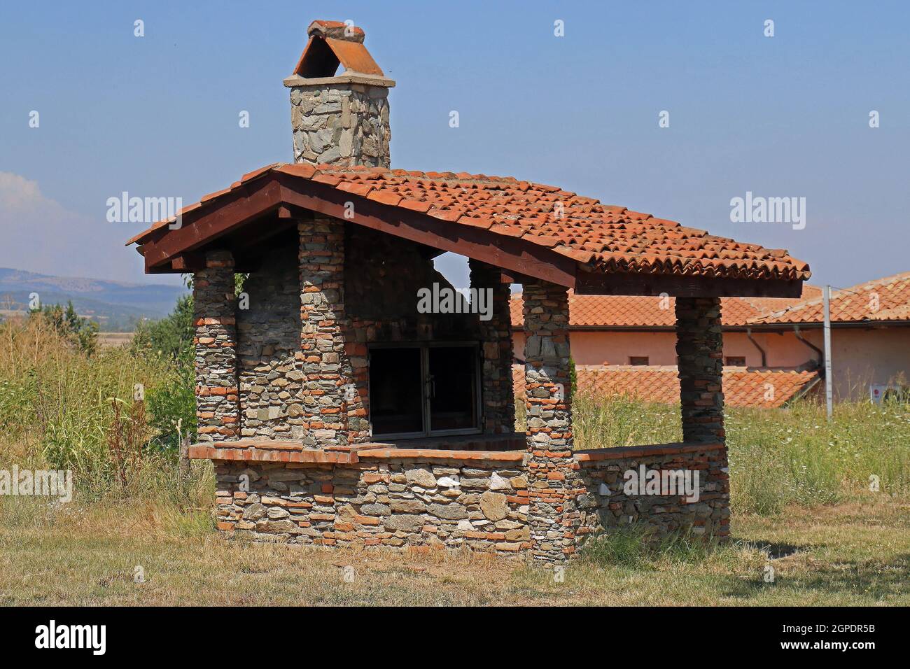 Old small run down house outside on rural lawn grass Stock Photo - Alamy