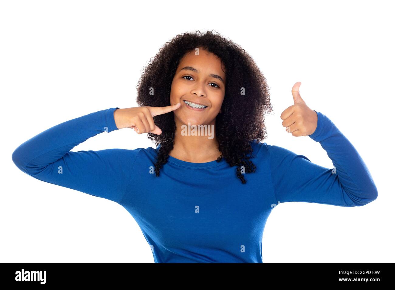 Teenager girl with afro hair wearing blue sweater isolated on a white ...