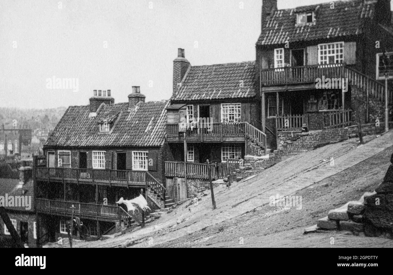 Houses built on steep hillside slope Black and White Stock Photos ...