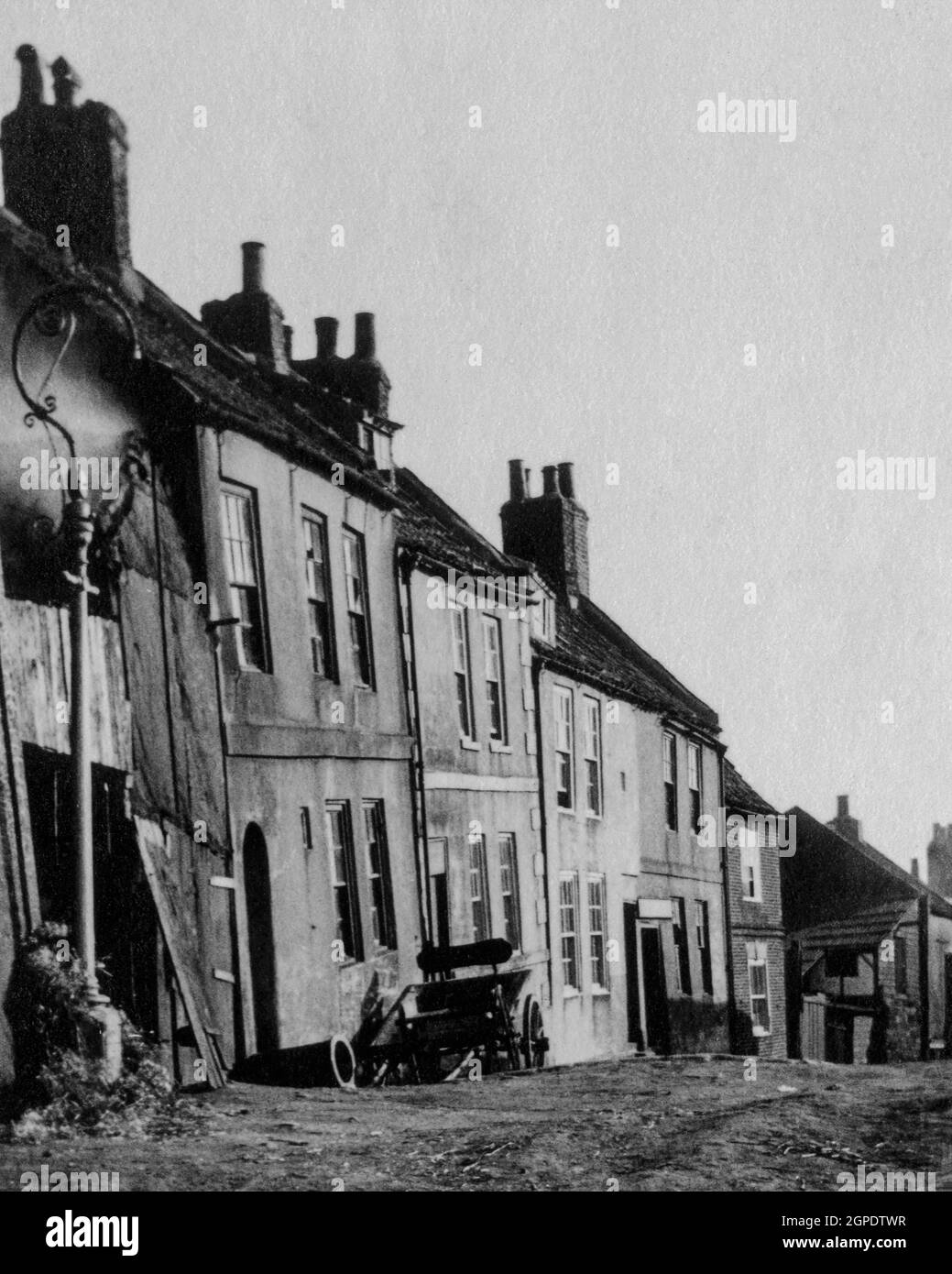 Dilapidated houses and horse cart in Whitby in August 1926 Stock Photo
