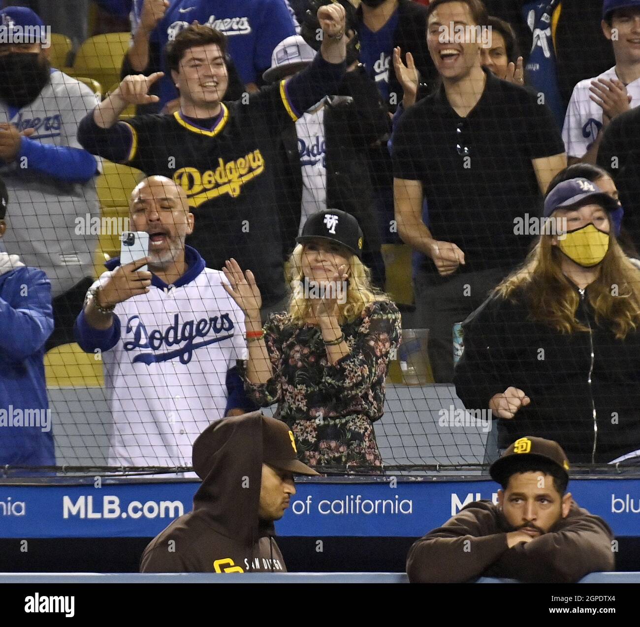 Los Angeles, USA. 29th Sep, 2021. Actress Chelsea Handler and her boyfriend Jo Koy attend the Los Angeles Dodgers game against the San Diego Padres at Dodger Stadium in Los Angeles on Tuesday, September 28, 2021. The Dodgers defeated the Padres 2-1 behind seven shutout innings from Walker Buehler. Photo by Jim Ruymen/UPI Credit: UPI/Alamy Live News Stock Photo