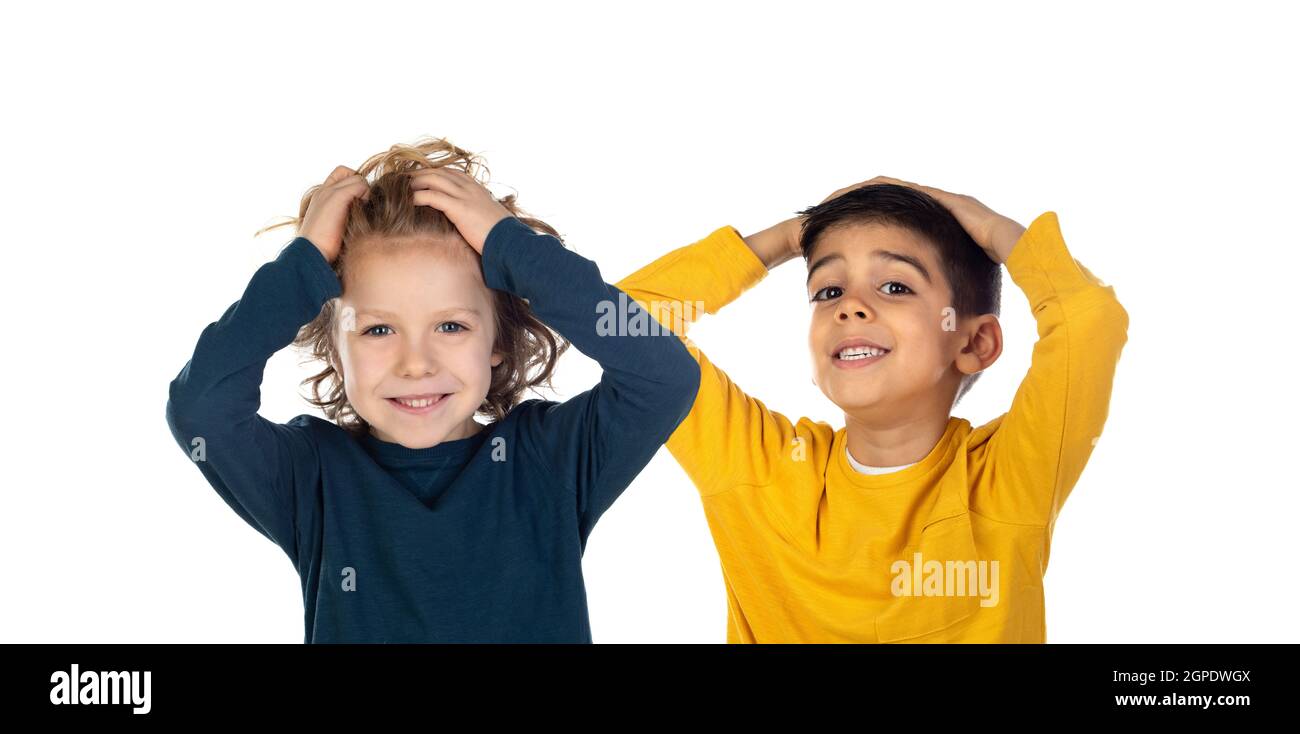 Children covering the ears and shocked by a loud sound isolated on a