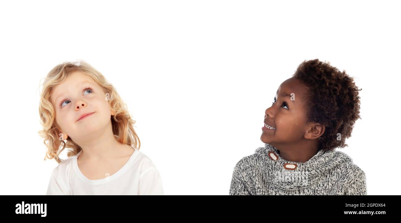 Two children looking up isolated on a white backround Stock Photo