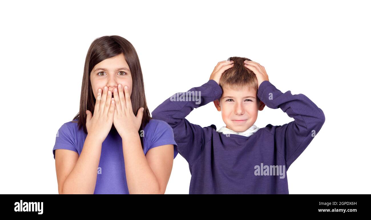 Children covering the ears and shocked by a loud sound isolated on a