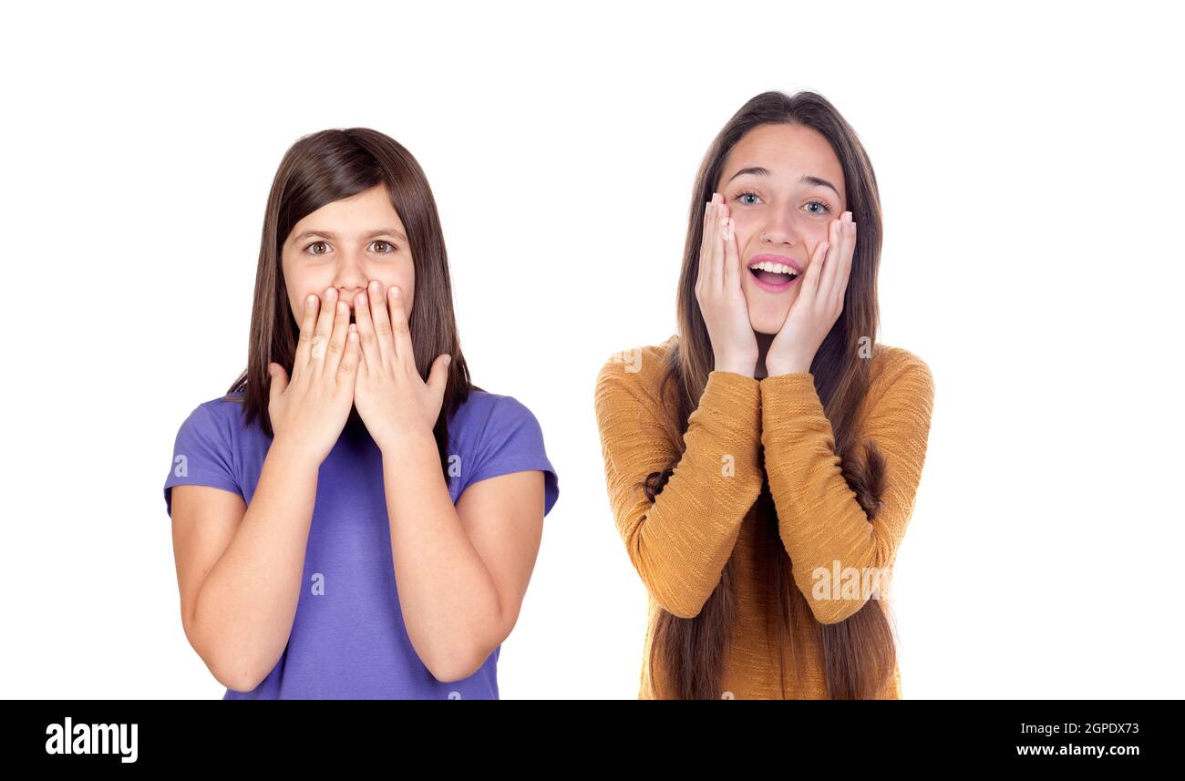 Children covering the ears and shocked by a loud sound isolated on a