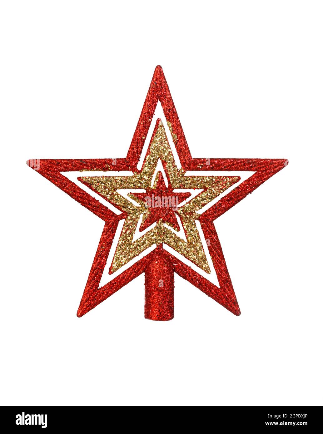 Bright red and golden star for the top of the Christmas tree isolated